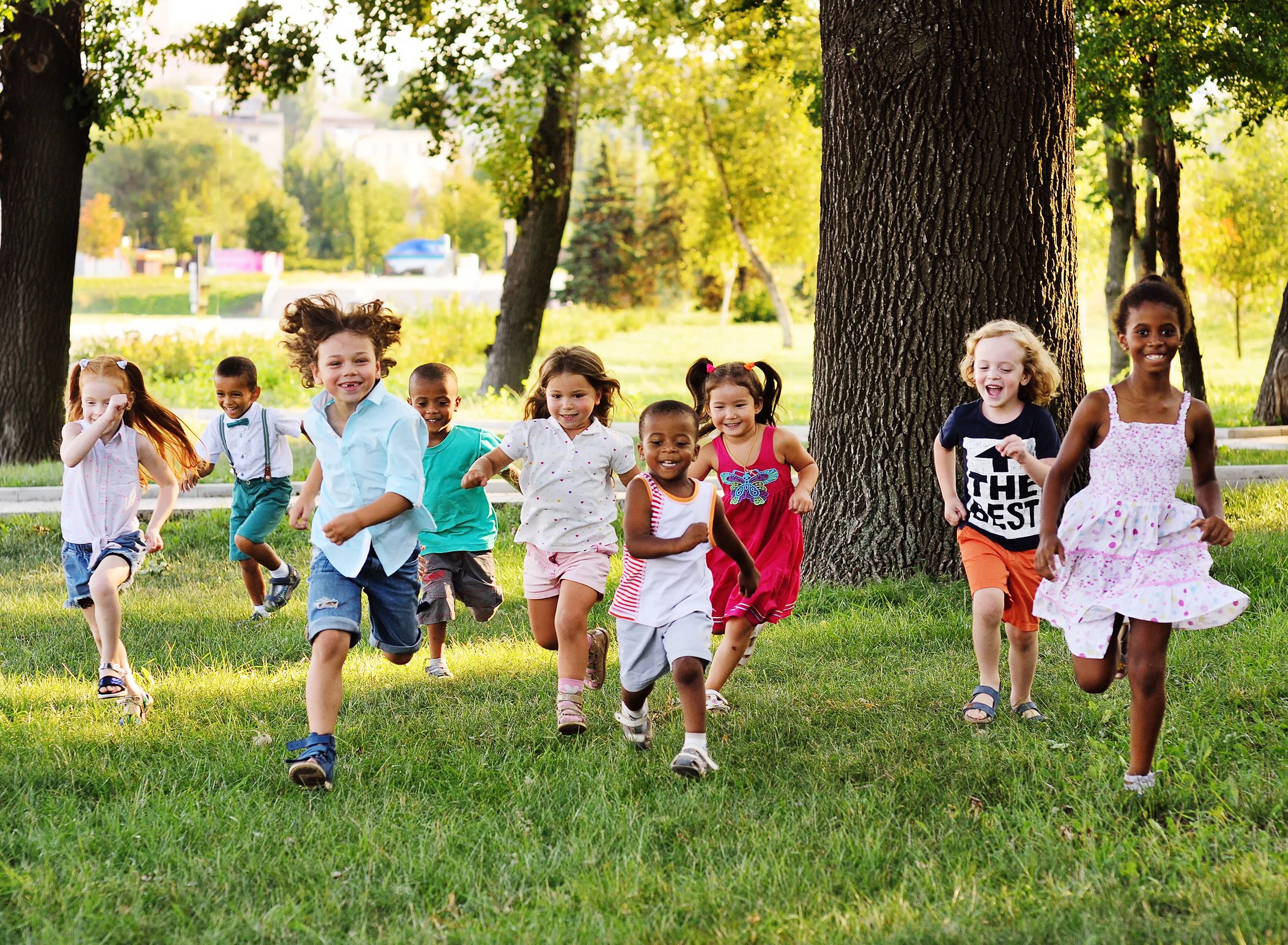 Children exploring nature during outdoor activities